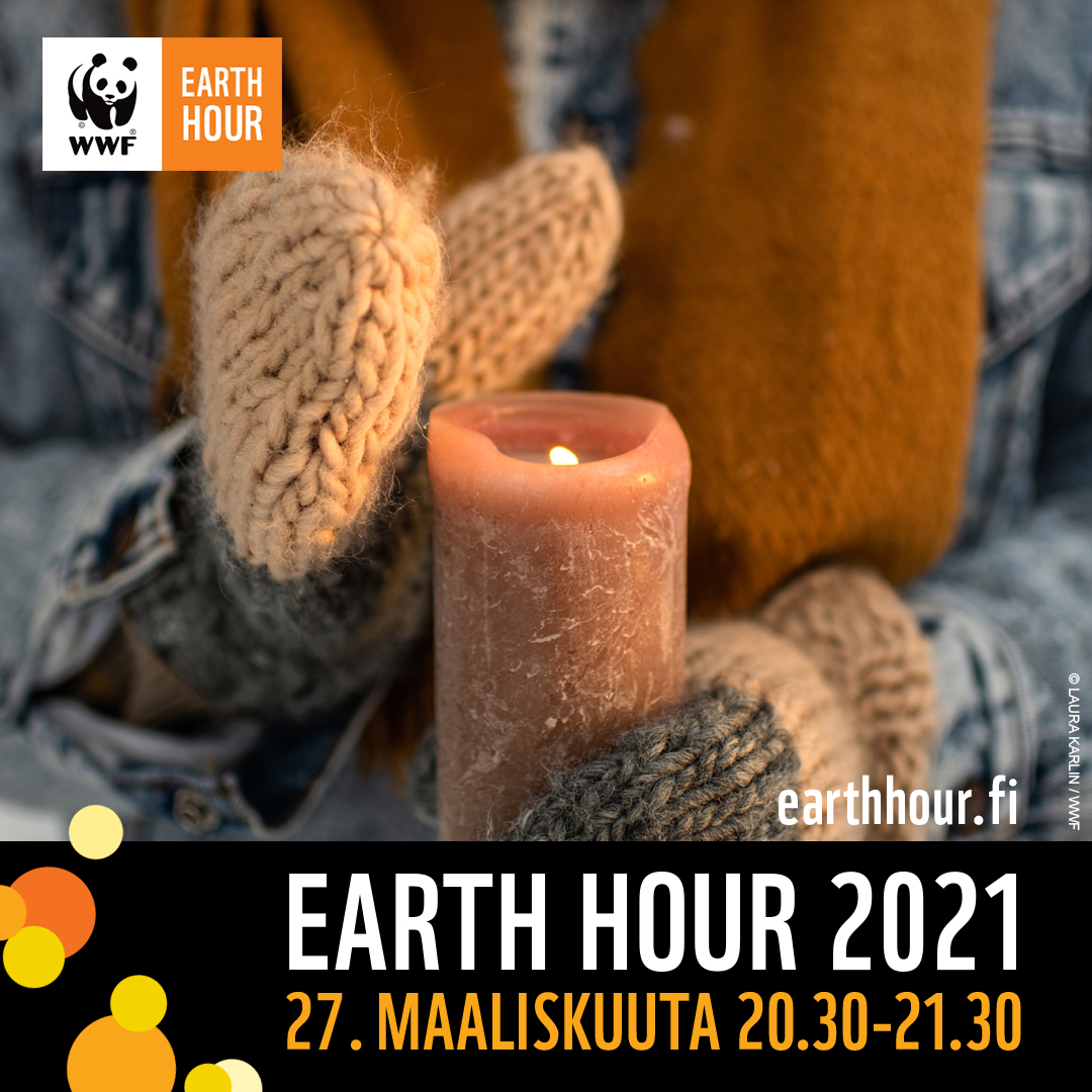 Earth Hour 2021 -tapahtuman kampanjakuvassa on kädet, joissa on lapaset ja jotka pitelevät kynttilää.