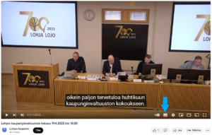 Kuvakaappaus Lohjan kaupunginvaltuuston kokoustallenteesta YouTubessa. Kuvassa on merkattu kohta, josta tekstitykset saa päälle.